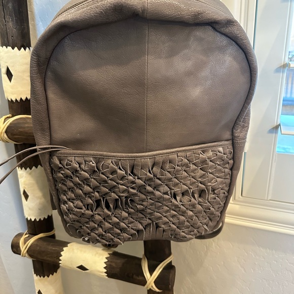 day and mood Handbags - Elegant Gray Soft Leather Backpack.